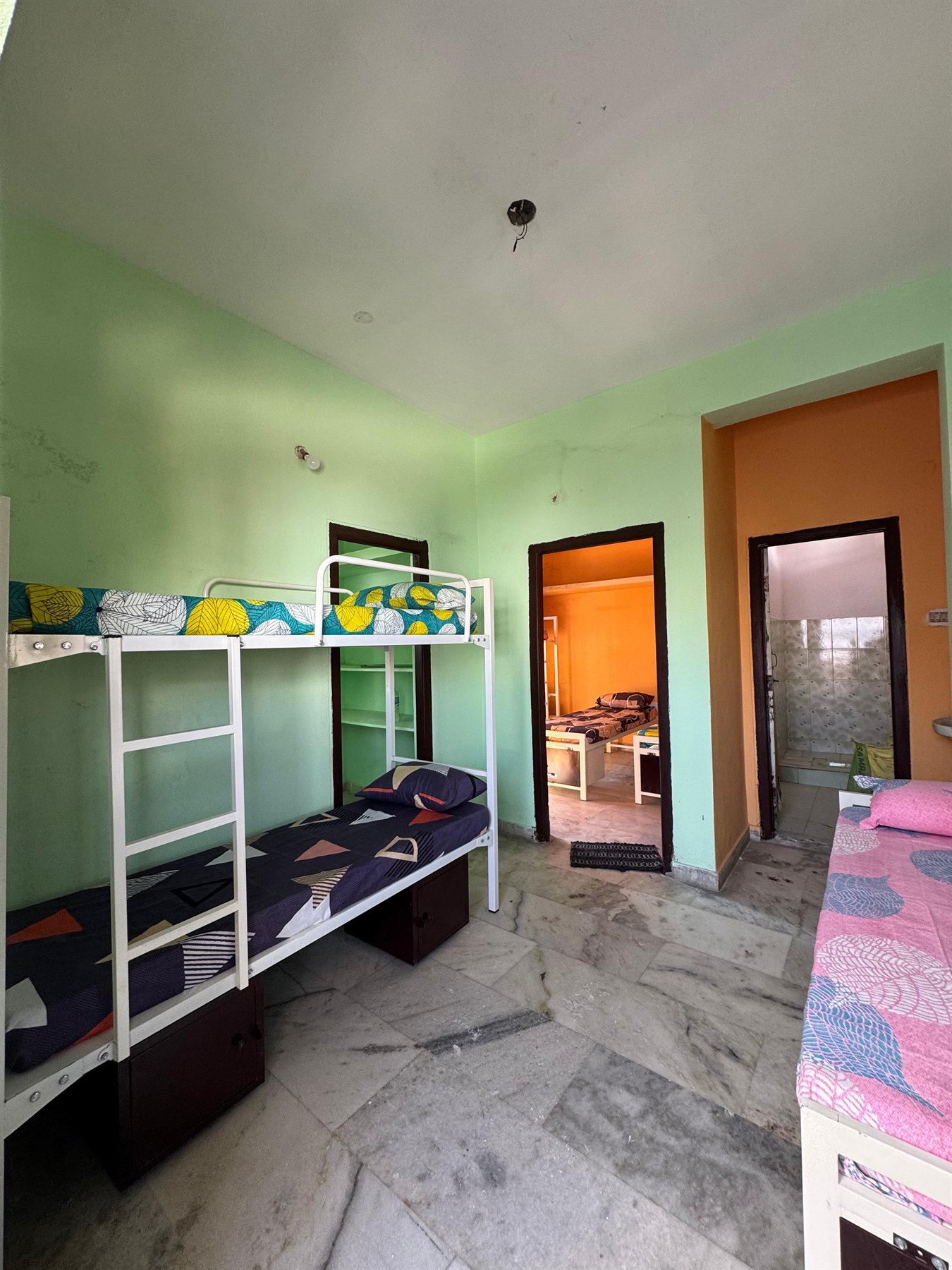 Boys hostel room bed and floor space